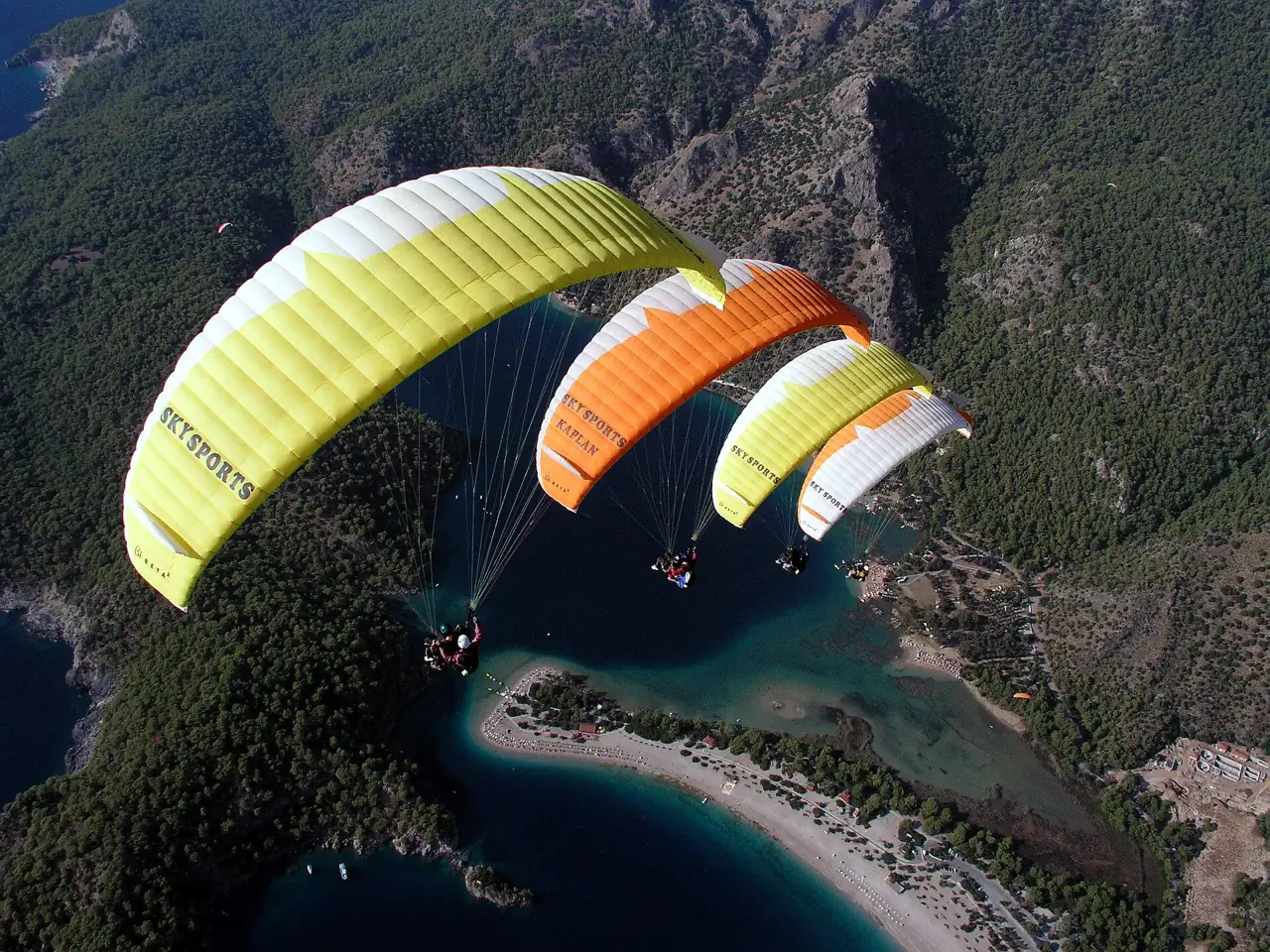 Paragliders above the Ölüdeniz lagoon