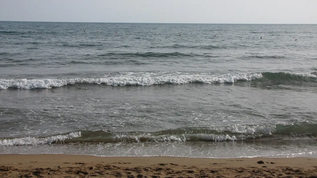 Waves on the wide sandy beach at Çolaklı near Side